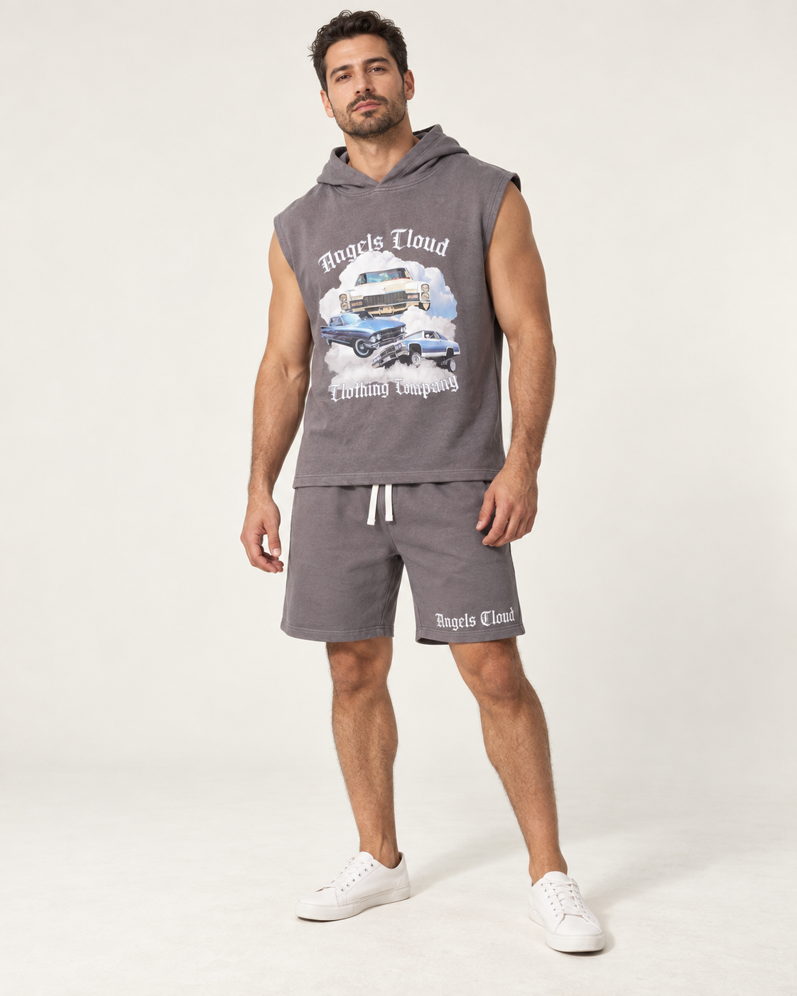 Father wearing a gray Caddy Dreams sleeveless hooded top and matching shorts.
