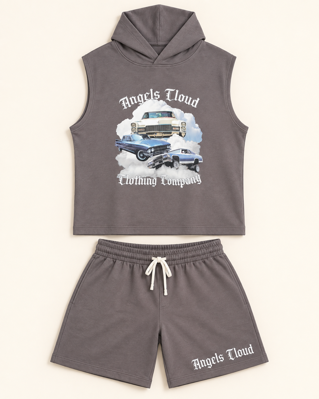 Studio edit: Caddy Dreams gray sleeveless hooded top and matching shorts laid out together.