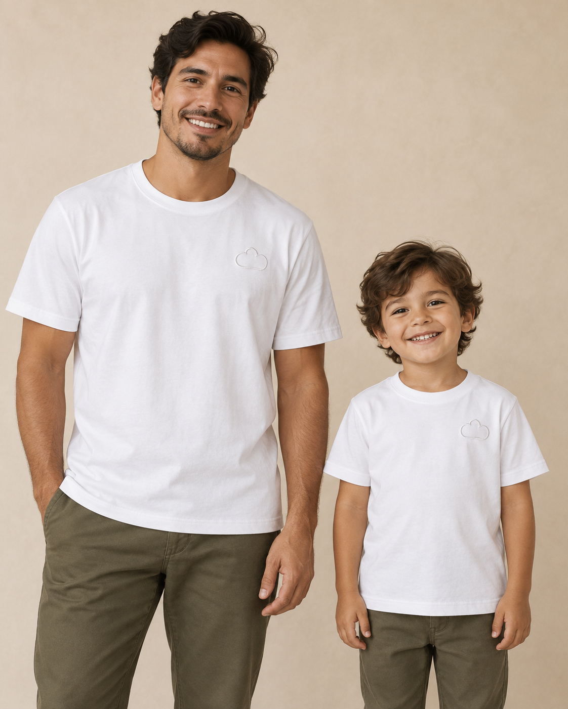 Father and child wearing matching White Horizon Tees with tonal cloud outlines.